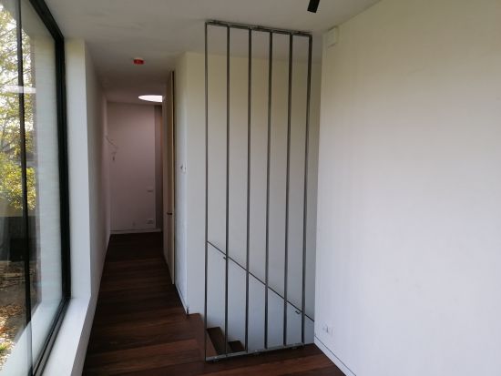 Scheidingswand en handleuning