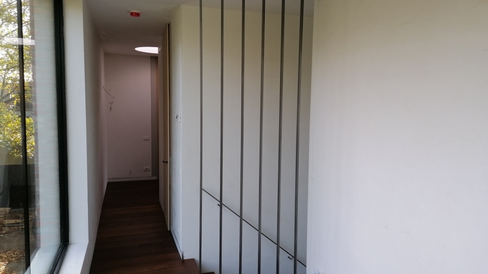 Scheidingswand en handleuning