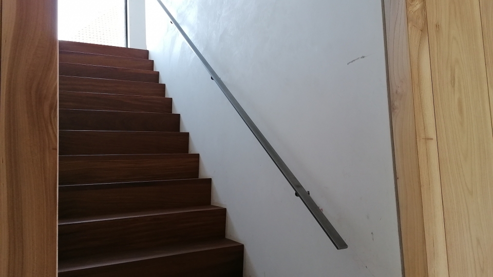 Scheidingswand en handleuning