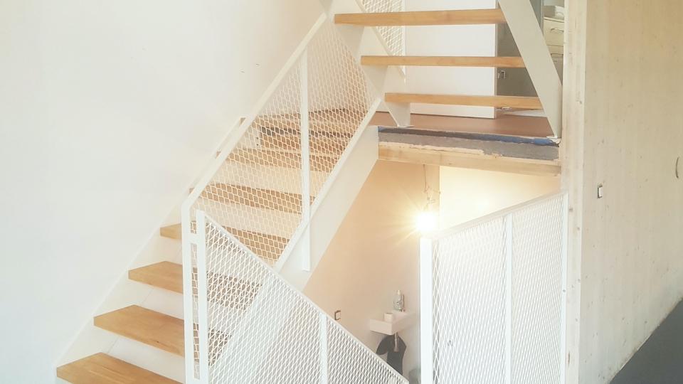 Op maat gemaakte trap en leuning
