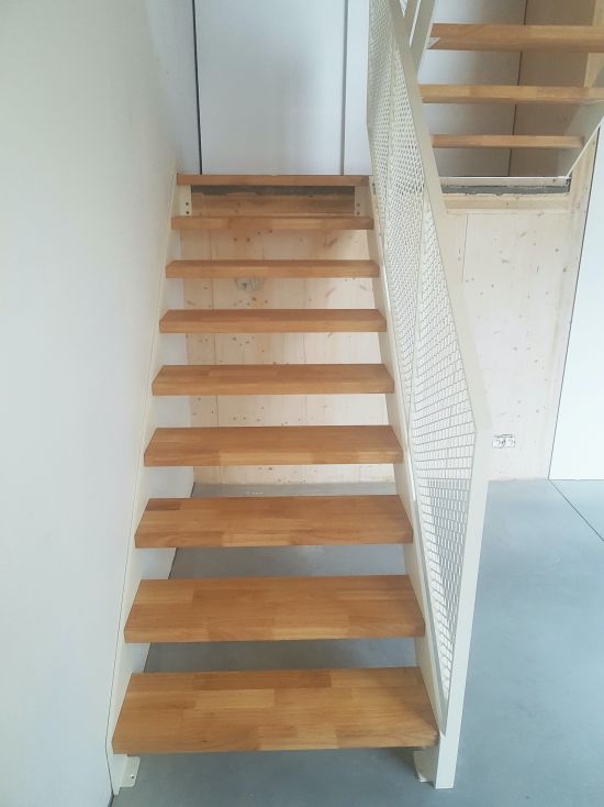 Op maat gemaakte trap en leuning